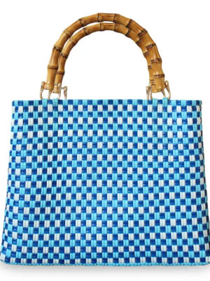 Brunna Co. TUKU Market Tote – Sustainable Style, Reimagined TUKU transforms recycled plastic into a beautifully woven market tote—one of 2025’s standout trends. Inspired by California’s farmers’ markets, each bag is named after a beloved local neighborhood and crafted to celebrate life’s simple joys. Featuring a timeless checker-weave, natural bamboo handle, and inner cotton drawstring pouch, TUKU is light yet structured—perfect from sunlit strolls to everyday errands. Dimensions: 10" x 8" x 6" Materials: 100% Recycled Plastic | Bamboo Handle | Removable Cotton Pouch